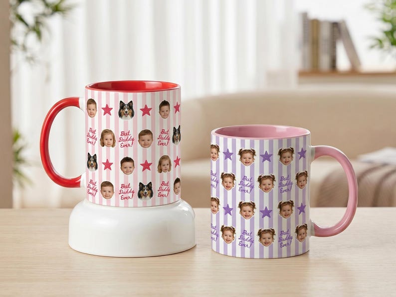 May include: Two ceramic mugs with personalized designs. One mug has a red handle and interior, featuring faces, stars, and the text "Best Daddy Ever" on a pink striped background. The other mug has a pink handle and interior, with faces, stars, and the text "Best Daddy Ever" on a purple striped background.