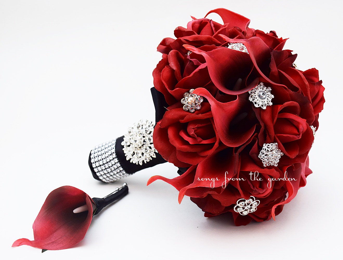 red rose bridal bouquet with diamond head pins,white ribbon and babies  breath.