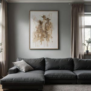 May include: A contemporary living room with a dark grey corner sofa and a chaise longue. An abstract painting in a wooden frame is mounted on the wall. The room has large windows with sheer curtains and decorative plants.