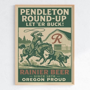 Puede incluir: Póster vintage enmarcado con un vaquero montando a caballo y lazando un toro. El texto dice "Pendleton Round-Up Let 'Er Buck!" y "Rainier Beer Since 1878 Oregon Proud."
