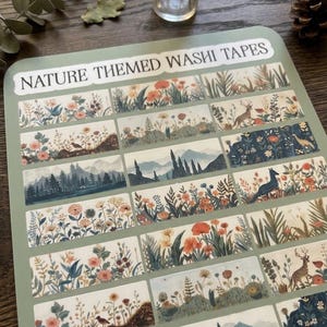 May include: A sheet of nature-themed washi tapes. Each tape strip features a different nature scene, including flowers, deer, mountains, and forests. The colour palette includes greens, blues, and oranges. The text "NATURE THEMED WASHI TAPES" is printed at the top.