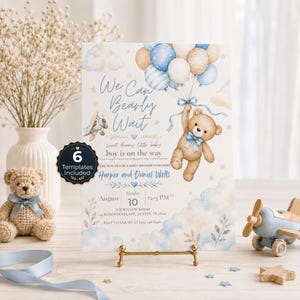 Redigerbar inbjudan till babyshower med björnballong, babyshowerinbjudan med "We Can Bearly Wait", blå Canva-mall för pojke, babyshower med plyschbjörn