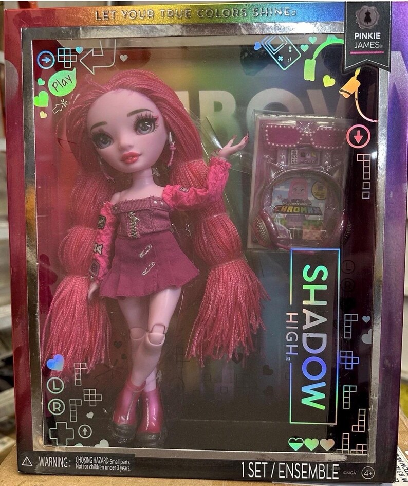 Shadow High fashion doll with long pink hair wearing a pink outfit, displayed in original packaging with accessories.