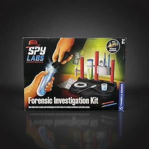 Spy Labs forensic investigation science kit with test tubes, tools, and lab equipment illustrated on the box for hands-on experiments.