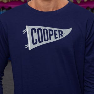Flagg Pennant Basketball Supporters Inspired Design, Dallas Star Player Tribute Graphic Tee, Custom Gift for Basketball Fans Unisex T-Shirt