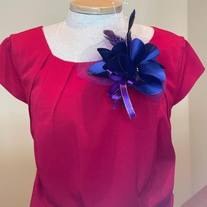 Handmade Unique African Violet Corsage for any occasion. Pearl pin and attachable magnetic included.
