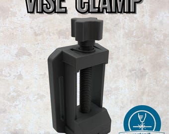May include: A black vise clamp with the text "VISE CLAMP" at the top. The clamp has a threaded rod and a star-shaped knob for tightening. The words "QUALITY PRODUCTS" and a logo are at the bottom.