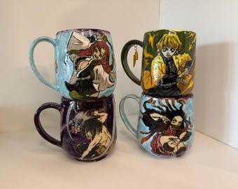 May include: Four ceramic mugs featuring hand-painted anime characters. The top left mug is light blue with a red-haired character. The top right mug is dark green with a yellow-haired character and a lightning bolt charm. The bottom left is dark purple with a boar-masked character. The bottom right is light blue with a long-haired character.