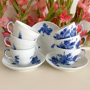 Price is for 1 Cup and 1 Saucer. Classic Curved Blue Flower &quot;Blå Blomst&quot; Assorted Motive No. 1549 Royal Copenhagen Cup and Saucer Set