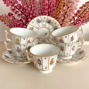 Price is for 1 Cup and 1 Saucer. Hand Painted Floral Antique Cup and Saucer Set. Royal Copenhagen Henriette INSPIRED. Read Description!