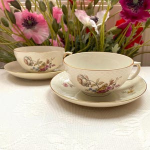 Price is for 1 Cup and 1 Saucer. Royal Copenhagen Green Orange Peony Frijsenborg. Rare Large Cup and Saucer Set. Gold Trim and Off White