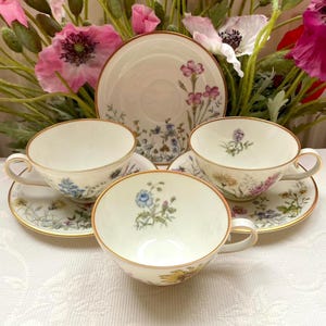 Price is for 1 Cup and 1 Saucer. Assorted Collectible Krautheim Bavaria. Off White Tea Cup and Saucer Set with Beautiful Wildflower Motive