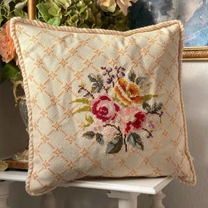 Botanical Rose Bouquet with Lattice Background. Handmade Needlepoint Cross Stitch Embroidered Square Wool Pillow. Off White with Corded Trim