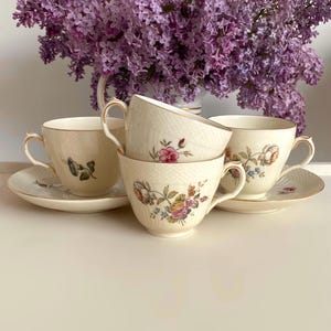 Price is for 1 Cup and 1 Saucer. Frijsenborg No. 910-1870 Cup and Saucer Set with Green Orange Peony Motive. Royal Copenhagen Porcelain