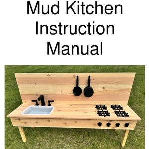 May include: A wooden mud kitchen with a sink, stove, and hanging pots. The kitchen has a light wood finish and is set against a green grass background. The text "Mud Kitchen Instruction Manual" is at the top.