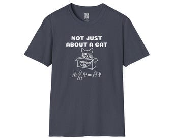May include: Dark blue t-shirt with white graphic text and a cat-themed design. The text reads "NOT JUST ABOUT A CAT" above a cat in a box illustration and a physics equation. A casual, short-sleeved tee.