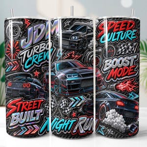 May include: A cylindrical tumbler featuring a black carbon fiber background with JDM car graphics, turbochargers, and checkered flags. Text includes JDM, TURBO CREW, SPEED CULTURE, BOOST MODE, STREET BUILT, and NIGHT RUN in vibrant red, blue, and white.