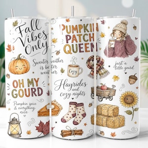 May include: Three white cylindrical tumblers with straws featuring autumn-themed illustrations including pumpkins, a person in a knit hat, hay bales, a sunflower, a lantern, and text such as Fall Vibes Only, Pumpkin Patch Queen, and Oh My Gourd.