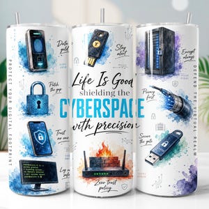 May include: A cylindrical tumbler featuring a white background with blue and purple watercolor accents. Graphics include a server, padlock, USB drives, and a router with fire. Text reads: Life Is Good shielding the CYBERSPACE with precision.