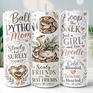 May include: A white cylindrical tumbler featuring watercolour illustrations of ball pythons, green plants, and hearts. Text includes "Ball Python Mom," "Slowly but Surely," "Boop the Snek," "Just a Girl and Her Noodle," and "Scaly Friends are the Best Friends."