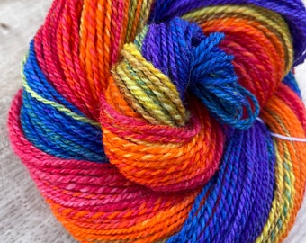 Rainbow Handspun Hand Dyed Superwash Cheviot Wool. A Sport Weight Yarn approximately 100 grams.