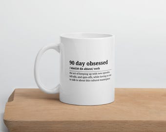Taza blanca brillante de 325 ml (90 días de obsesión) - Reality TV