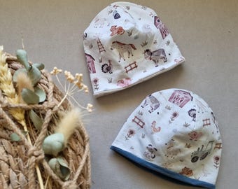 Reversible farm beanie for children made of cotton jersey