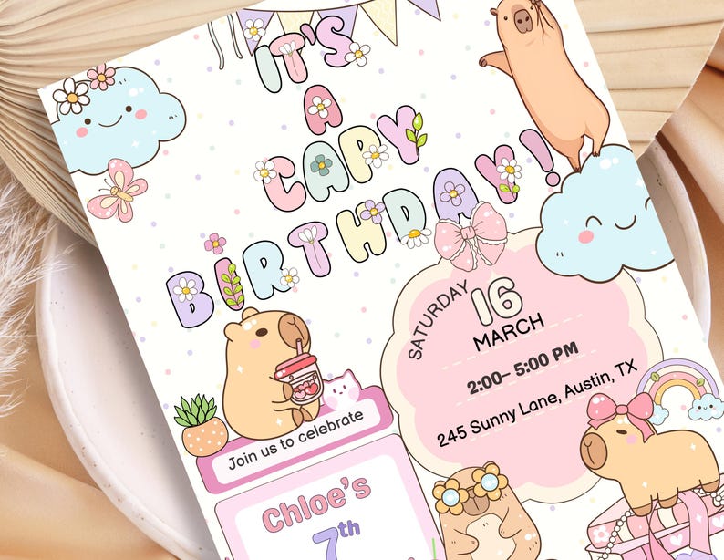 May include: A whimsical birthday invitation featuring a capybara theme. The design includes the text "It's a Capy Birthday!" with cute illustrations of capybaras, flowers, clouds, and a rainbow. The invitation is for Chloe's 7th birthday, March 16th.
