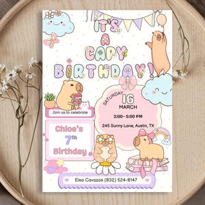 May include: A whimsical birthday invitation featuring cartoon capybaras, pastel colors, and the text "It's a Capy Birthday!" The invitation includes event details: date, time, and location. The design incorporates clouds, rainbows, and floral elements.