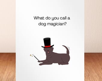 May include: Greeting card with a cartoon illustration of a brown dog wearing a black top hat with a red band and holding a magic wand. The text reads, "What do you call a dog magician?"