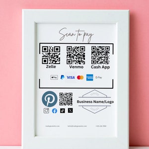 Puede incluir: Señal enmarcada en blanco con el texto "Scan to Pay" y códigos QR para Zelle, Venmo y Cash App. La señal también incluye logotipos para Apple Pay, Visa, Mastercard y Google Pay. Debajo de los códigos QR hay un logotipo con el texto "Business Name/Logo".
