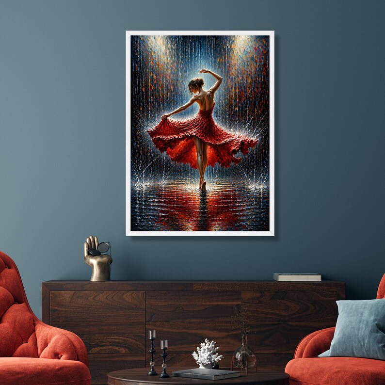 May include: A framed art print showing a dancer in a red dress, dancing in a rain-like setting. The artwork has a reflective surface, creating a mirrored effect. The background features a blend of blue and gold hues, adding depth to the scene.