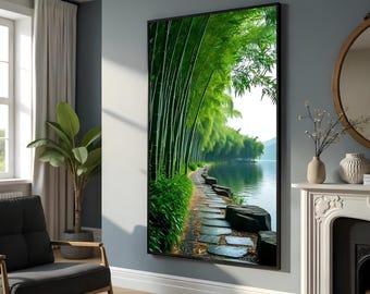 May include: A framed art print depicts a serene bamboo forest scene. A stone path winds along a tranquil lake, bordered by lush green bamboo stalks and foliage. The artwork evokes a sense of peace and natural beauty, perfect for home decor.