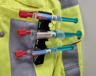 Soporte para medicamentos y abridor de ampollas: práctico, seguro y siempre a mano.