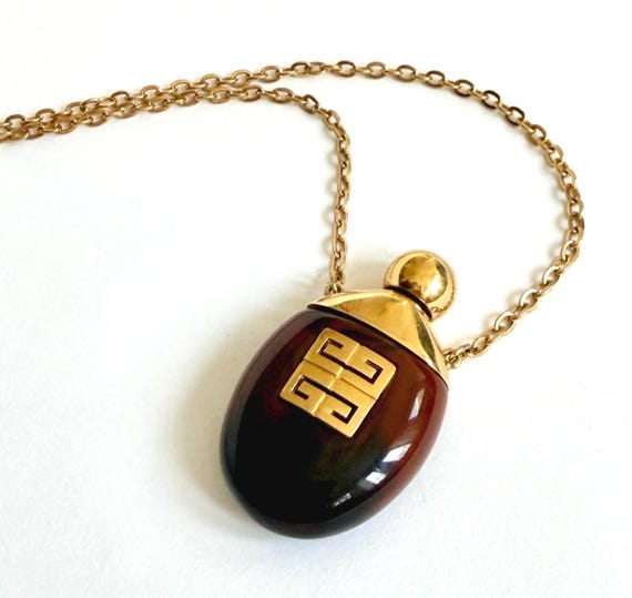 Vintage 1977 Givenchy Perfume Bottle Pendant Necklace Faux Tortoise Gold Tone Chain