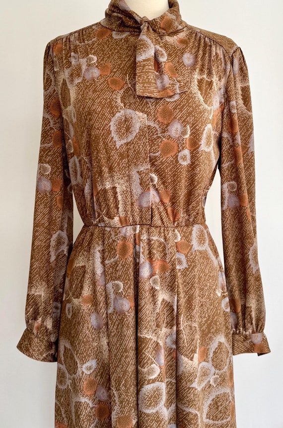 70s French Floral Dress Vintage Brown Beige Gray Leaf Botanical Print Day Dress Tie Neck Detail Elastic Waist Midi Tea Length Long Sleeve