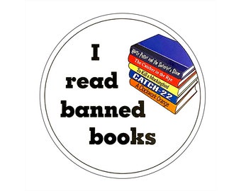 May include: A white circle with a black border and the text "I read banned books" in black. A stack of books is shown with the titles "Harry Potter and the Sorcerer's Stone", "The Catcher in the Rye", "To Kill a Mockingbird", "Catch-22", and "A Clockwork Orange".