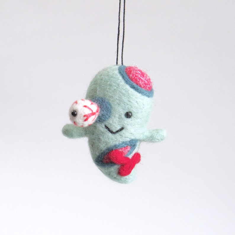 miniature needle felted zombie ornament with black hemp string