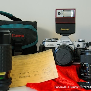 Canon AE-1, x3 Lenses, Flash, Bag, New Seals