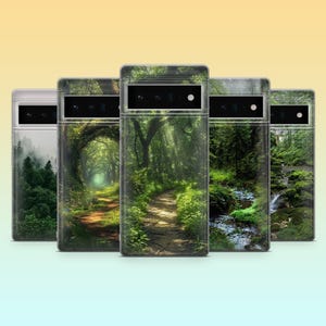 May include: A collection of phone cases featuring nature scenes. The cases display images of forest paths, streams, and lush greenery. The cases have a clear frame and a black camera bar.