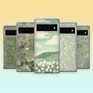 Può includere: Una collezione di cinque custodie per telefoni con vari design verdi. Le custodie presentano motivi floreali, arte paesaggistica con tulipani bianchi e altri motivi ispirati alla natura. Le custodie sono esposte su uno sfondo sfumato.
