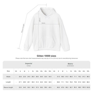 May include: White Gildan 18500 hoodie with size chart. The chart shows measurements in inches and centimeters for width, length, and sleeve length, ranging from XS to 5XL. The hoodie has a hood and a front pocket.