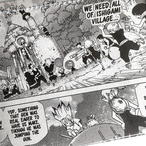 May include: A clear, rectangular wallet featuring a black and white manga panel. The panel depicts a village scene with characters and text bubbles. The wallet has a stitched border and is set against a white background.