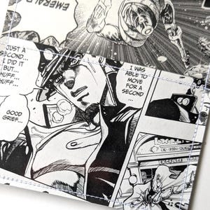 May include: A black and white manga-style print featuring panels with speech bubbles and action scenes. The text includes phrases like "Good Grief" and "I was able to move for a second." The print has a stitched border.