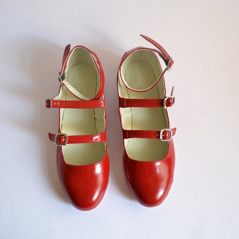 red flats with strap