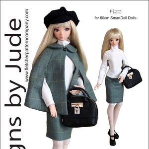 May include: A doll wearing a green plaid cape, skirt, and black beret, holding a black handbag. The doll is wearing a white top and white stockings. The image includes the text "Designs by Jude" and "Fizz for 60cm SmartDoll Dolls."