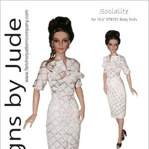 May include: A white lace dress with a bow detail at the neckline. The dress is designed for 16.5 inch dolls. The text "Socialite" and "Designed by Tamara Casey" is printed on the image. The price is £12.95.