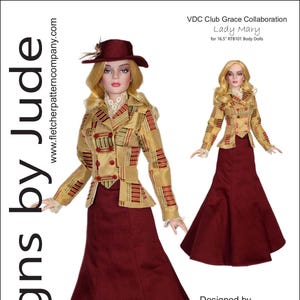 May include: A doll wearing a burgundy skirt and a gold and red patterned jacket with a matching hat. The text "Designs by Jude" and "Lady Mary" are visible. The price tag reads $12.95 US.