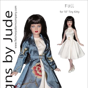 May include: A sewing pattern for a 10-inch doll outfit called "Fall". The pattern includes a white dress with a blue jacket with floral embroidery. The pattern is presented by Tamara Casey.