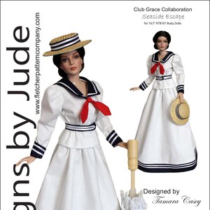 May include: A doll wearing a white sailor-style dress with navy blue trim and a red necktie. The doll is also wearing a straw hat. The image includes the text "Designs by Jude" and "Seaside Escape".